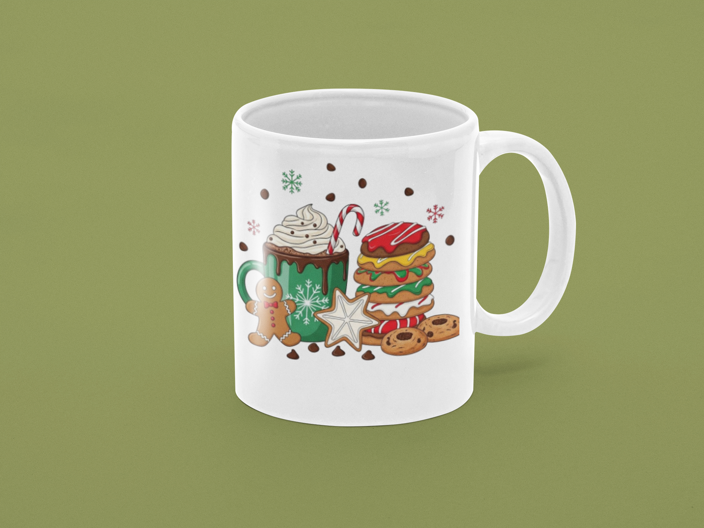 White mug with festive design on a green background